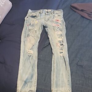 Distressed Light Blue Jeans